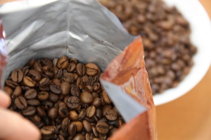 Segafredo Selezione Crema geöffnete Verpackung und Bohnenbild